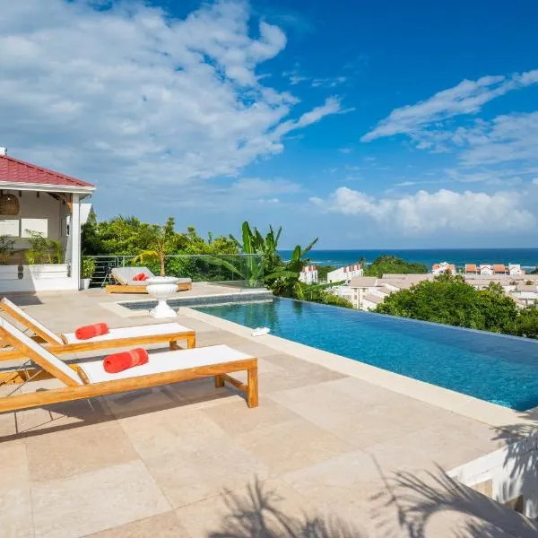 Résidence Les Raisins Clairs - Villas standing 4 étoiles , vue sur mer panoramique & piscine à débordement, hotel in Saint-François