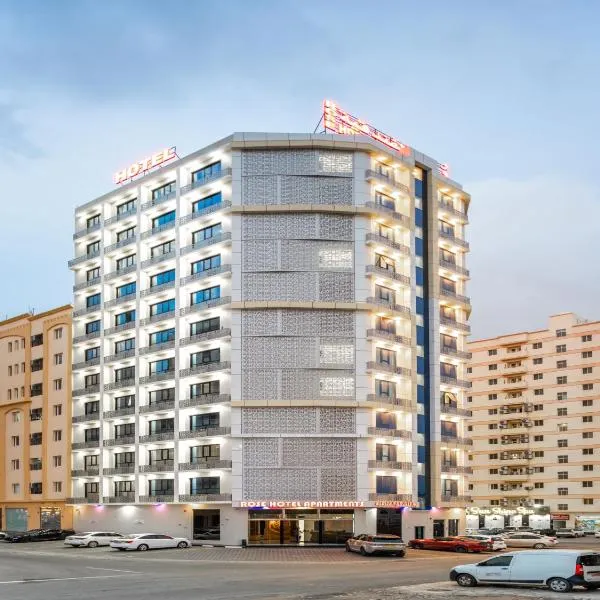 OYO Townhouse 156 Rose Hotel Apartments, hotel in Al Khawḑ