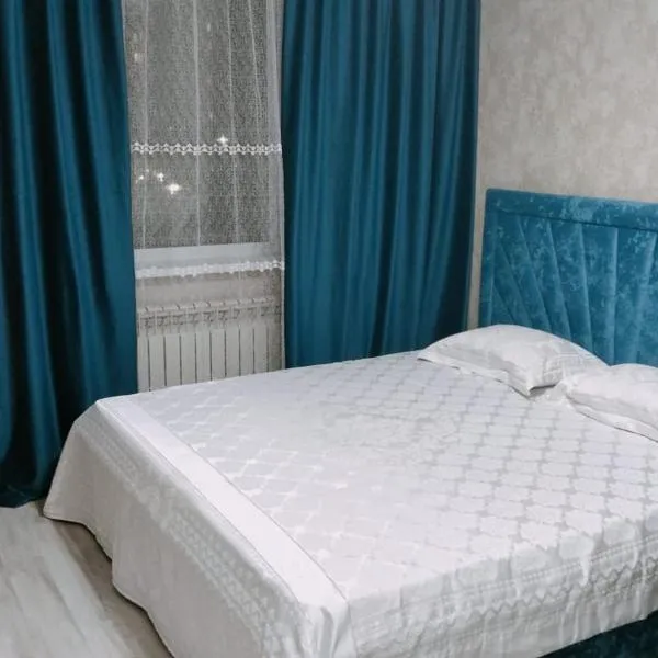 Однокомнатная квартира рядом ГДБ2, Айнаколь, Хазрет Султан、Promyshlennyyのホテル