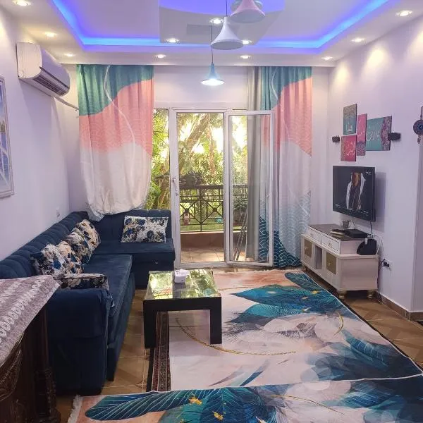 Cozy apartment with a private garden in Giza, khách sạn ở ‘Izbat Yūsif Barrādah