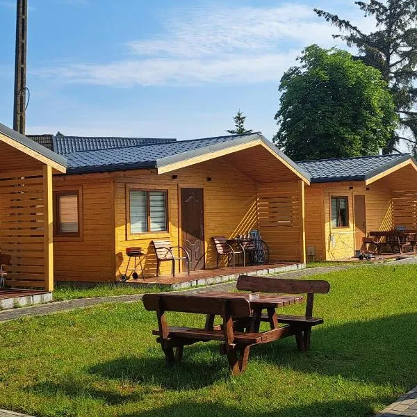 Słoneczne Domki parterowe Pustkowo, 1 minuta od plaży, hotel in Pustkowo