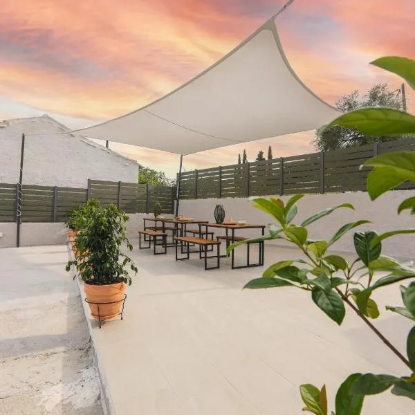 Olive Green Suites, Sidari, hotel in Kounavádes