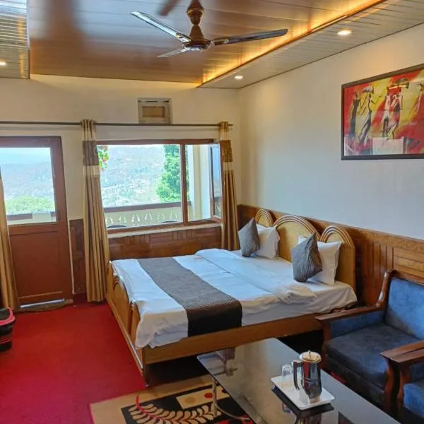 Hotel Tribhuvan Ranikhet Near Mall Road - Mountain View -Parking Facilities - Excellent Customer Service Awarded - Best Seller، فندق في Chaubattia