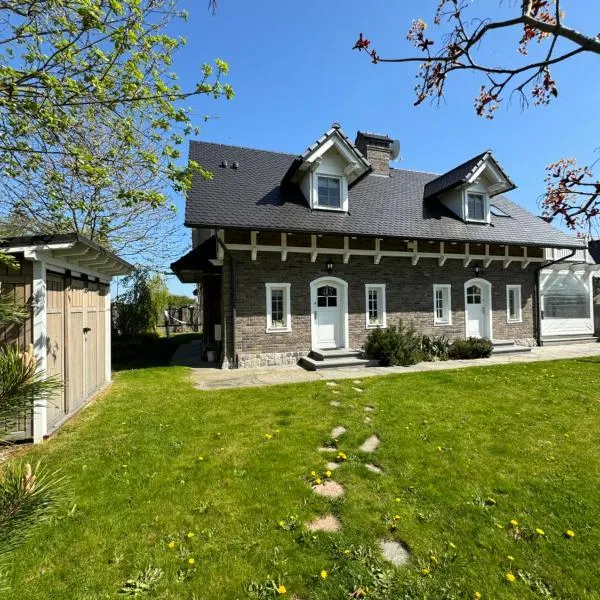 Bay Cottage wynajem domków, hotelli kohteessa Swarzewo