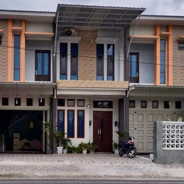 An Nisa Homestay Syariah Aceh Mitra RedDoorz, отель в городе Cotgirek
