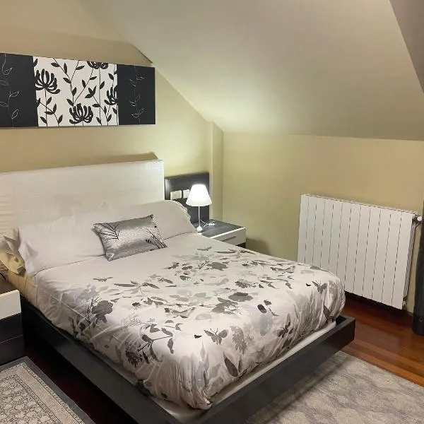 Habitaciones en chalet con jardín, hotel Boó de Piélagosban