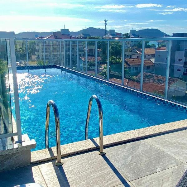 Sol e praia c/ piscina em apto iluminado c/conforto