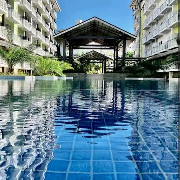 212B Amani Grand Resort Residences near Mactan Airport with pool, gym, wifi, netflix, hotel a Pusok
