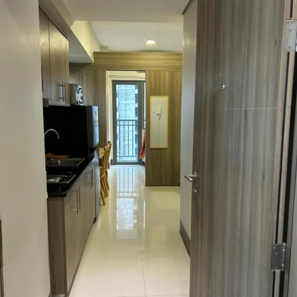 Cairong Inn Condominium pool TV with Netflix FAME RESIDENCES、マニラのホテル