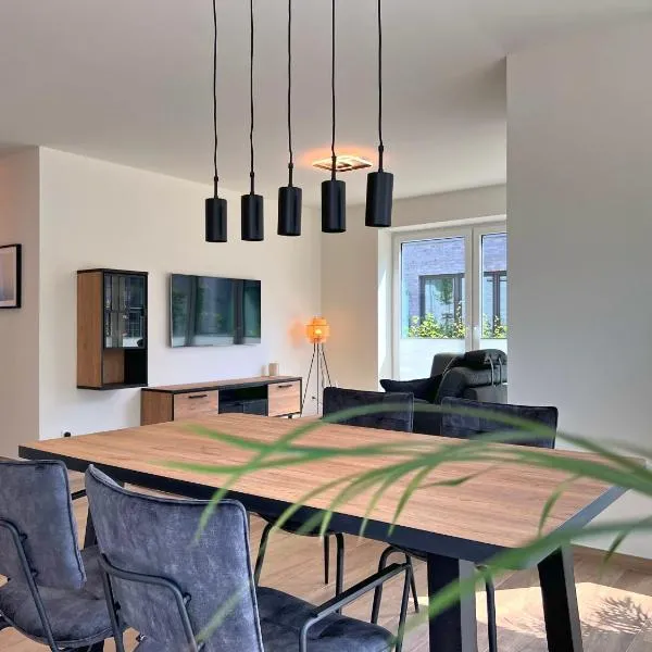 Haus Kiebitz 1 EG, хотел в Варел