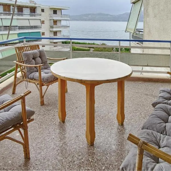 Διαμέρισμα δίπλα στη θάλασσα, παραλία Μαρκοπούλου, hotel en Oropo