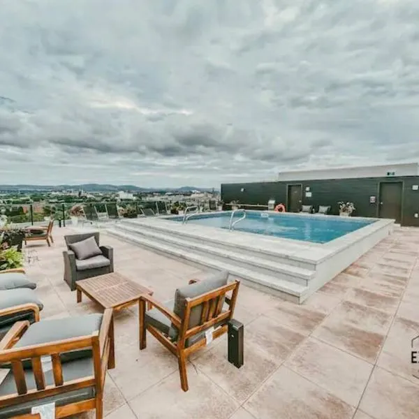 Condo - 305 Piscine BBQ WIFI, hotel in Quebec City