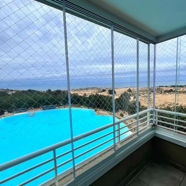 Espectacular departamento Vista Laguna y mar aceptamos mascotas, hotel in Las Cruces
