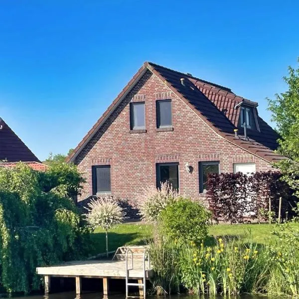 Ferienhaus Fehnglück，Ihlow的飯店