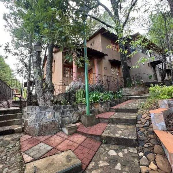 Acogedora cabaña en Quercus 1, hotel en Pátzcuaro