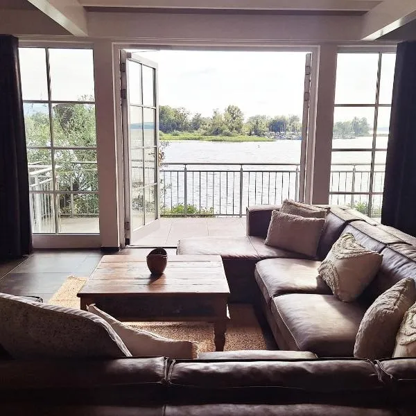 Strandhaus Chiemsee, hotel in Übersee