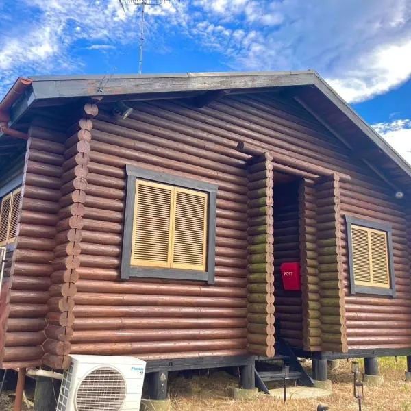 MOTOSUGA Log House, hotel v destinaci Sanmu