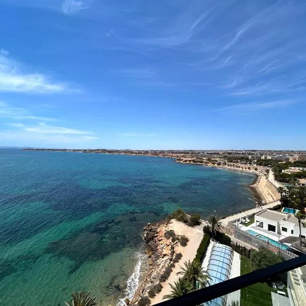 POSIDONIA PENTHOUSE Vista Panoramica al Mar by GrupoQuattro, khách sạn ở Punta Prima