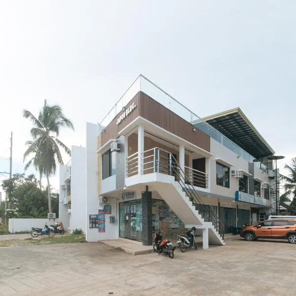 RedDoorz at Happy Stay Apartelle, hotel v destinaci Dauis