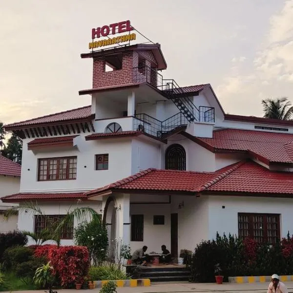 NAVARATHNA International resort, hotel a Sollebail
