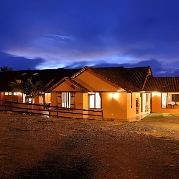 Fantástica Hacienda Represa del Sisga WiFi TV BBQ, hotel Chocontában