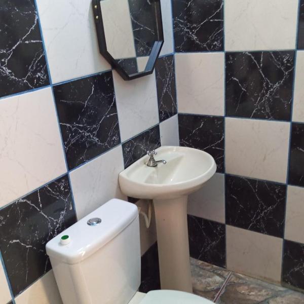 Quarto, garagem, portão automático, banheiro, wi-fi, tv, frigobar e ventilador de teto - Foto 3