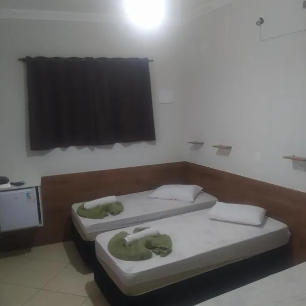 Pousada Quarto Aconchegante Suite com garagem perto da basílica, hotel in Aparecida