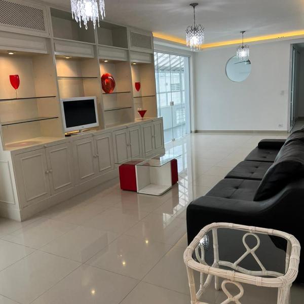 Cobertura 5 suites frente mar Guarujá Pitangueiras