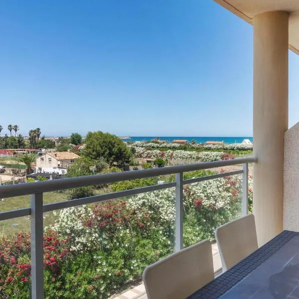 Magnifico Apartamento en PLAYA DE DAIMUS, hotel en Gandía