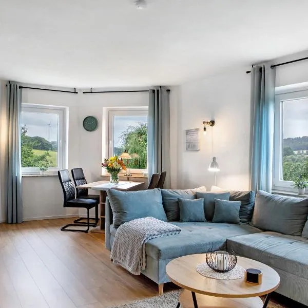 Ferienwohnung Glücksmomente, מלון בHabichtswald