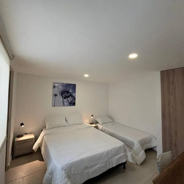 Apartaestudio moderno cerca al cable, hotel in Manizales
