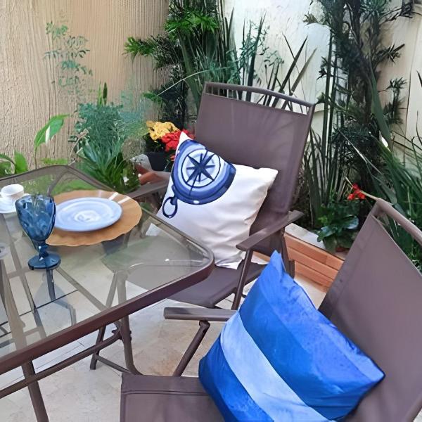 Studio pé na areia com área de churrasco privativa
