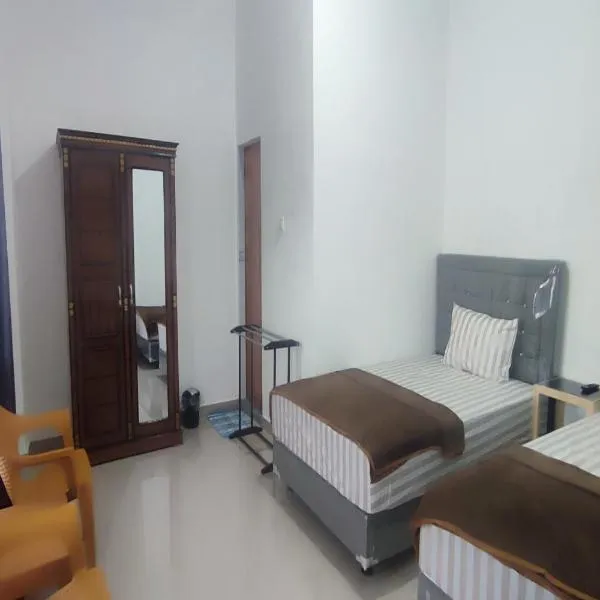 Guesthouse Pondok Amak, hotel in Padang