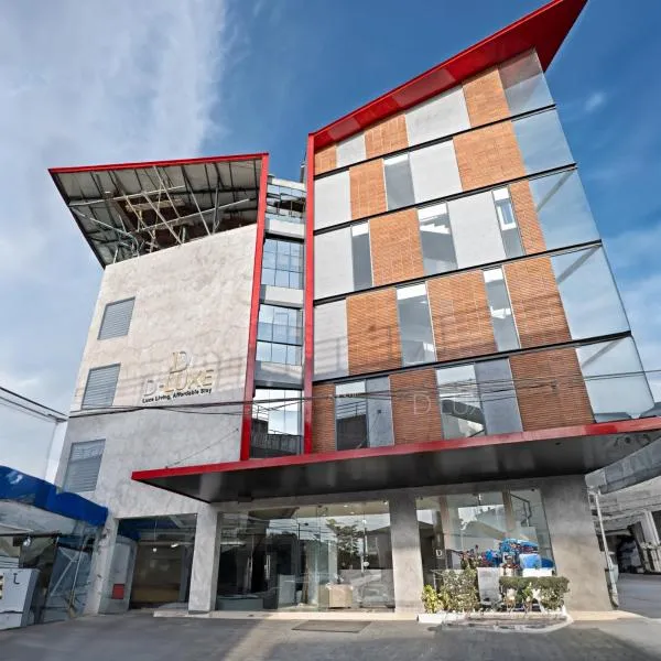 D-Luxe Hotel, hotel i Ernakulam