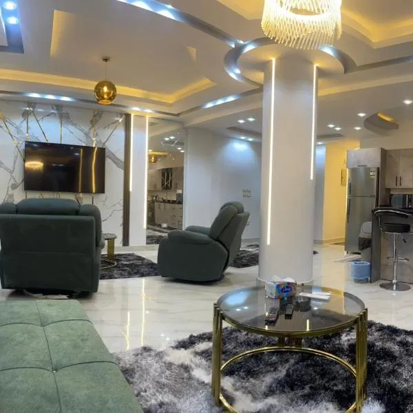 شقة فندقية غرفتين بكمبوند قرب ميدان جهينة, hotel em Sheikh Zayed