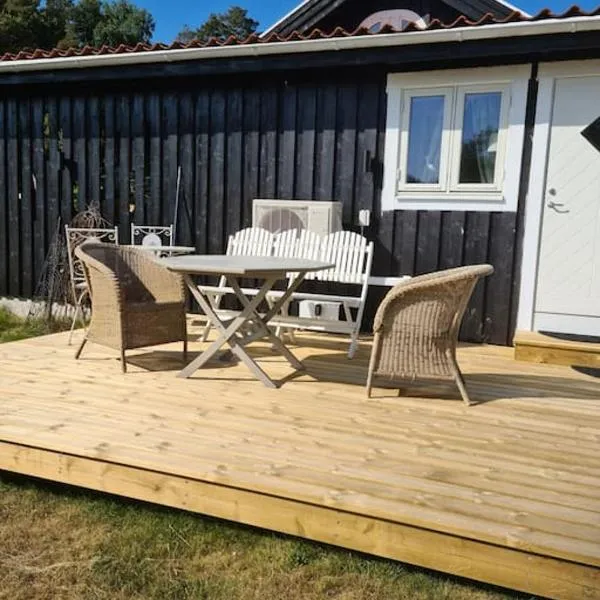Förtjusande gästhus med parkering, hotel v destinaci Fjällbacka