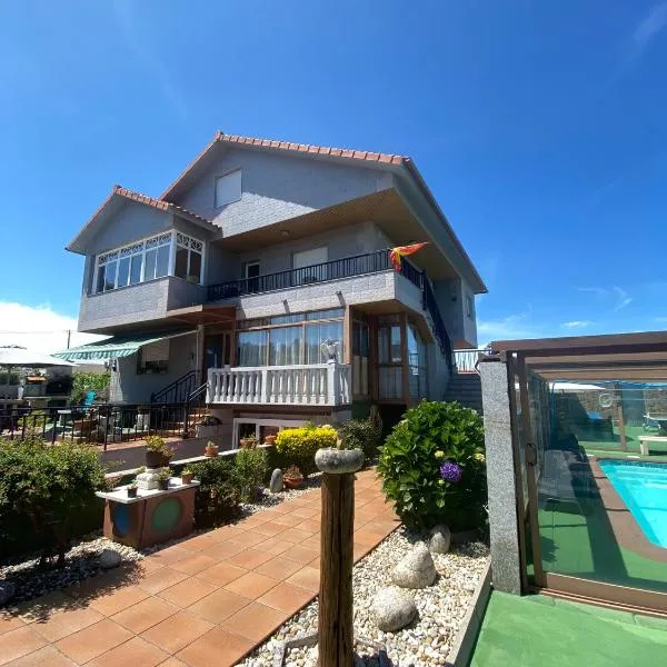 Apartamentos Victoria en Sanxenxo، فندق في بونتيفيدرا