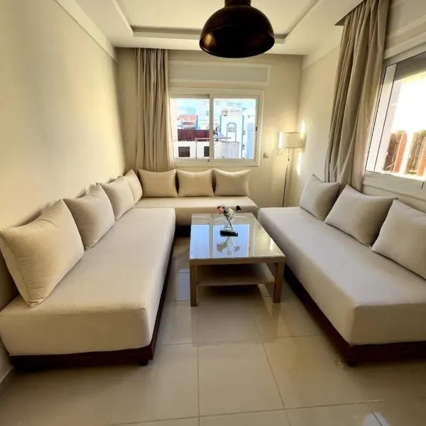 Mina - Elegante Stadtwohnung nähe Strand, hotel in M'diq