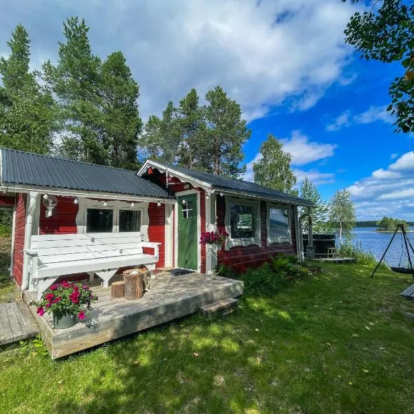 Laplandliv cabin on the lake with hottub, hotel v destinaci Björkliden