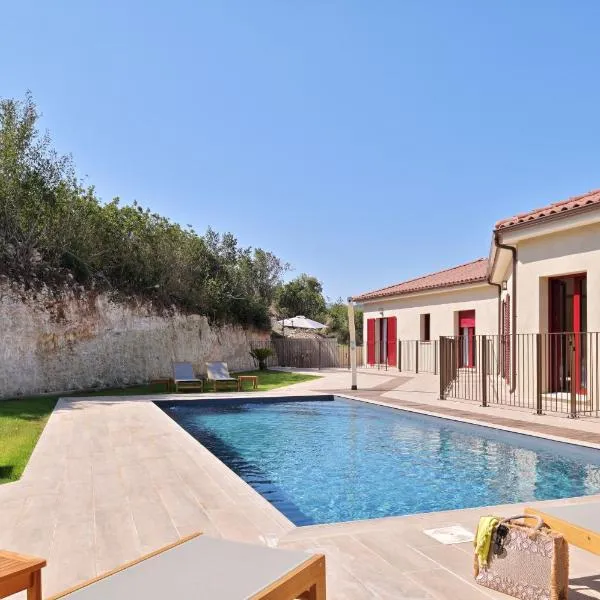 Résidence Les volets rouges - Duplex de standing avec piscine, hotel in Oletta