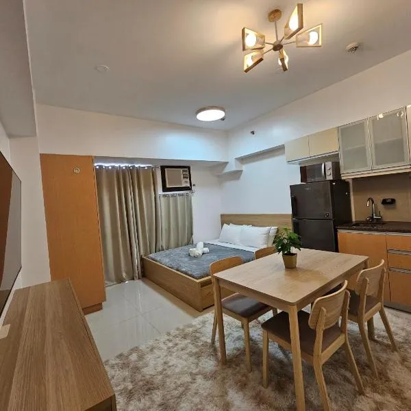 Affordable Condo Suite with 150mbps WIFI، فندق في مانيلا