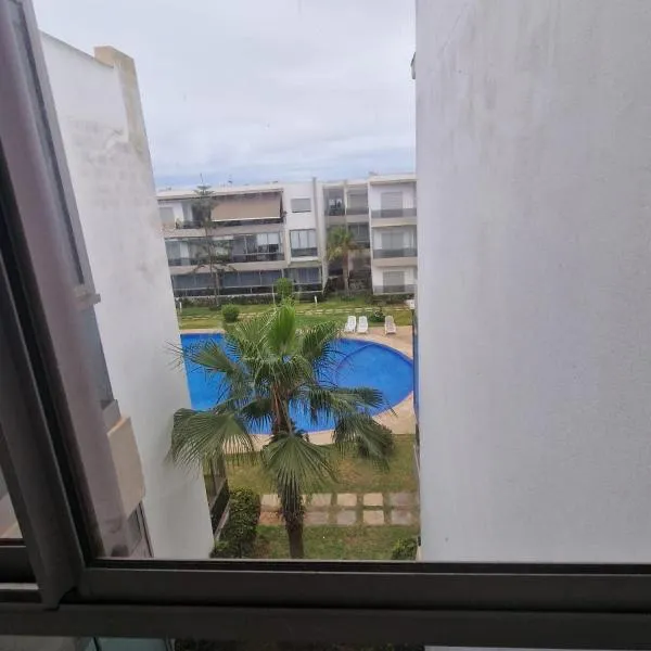 2 bedroom appart at the beach in gated community with pool, hotel in Sidi Rahal