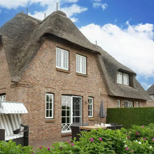 Seesucht-Föhr - Moderne Reet-Haushälfte mit Sauna, Garten & Terrasse nahe Wattenmeer, hotel v destinaci Utersum