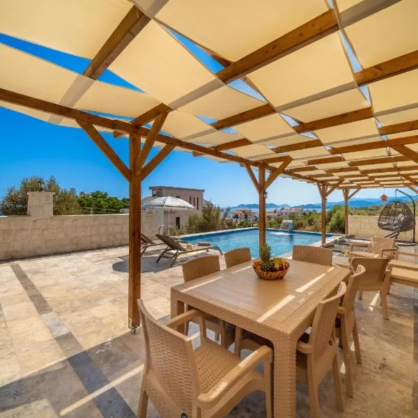 Villa Bella, hotel a Kum