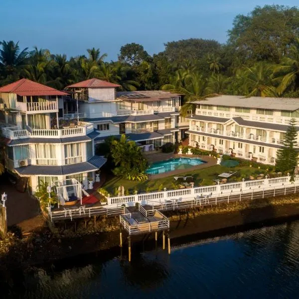 Stone Wood Riverfront Resort, Siolim, hotel v destinaci Siolim