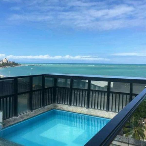 NA BEIRA MAR DE PAJUCARA- EDIF NEO- APARTAMENTO QUARTO E SALA - POSSUI VARANDA- VISTA LATERAL DO MAR-RUA JULIO PLECH FILHO 60 ESQUINA COM AVENIDA DOUTOR ANTONIO GOUVEIA - CONSUMO ELETRICO É PAGO No CKECK-OUT - 1 KWH É 1,35 REIAS - TEM TELA DE PROTEÇÃO - Foto 4