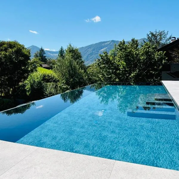 place2be - with infinity pool, hotel em Faistenau