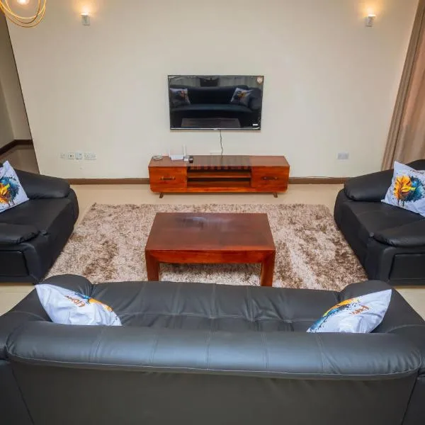 Spacious 2BR w pool & Gym, hôtel à Dar es Salaam
