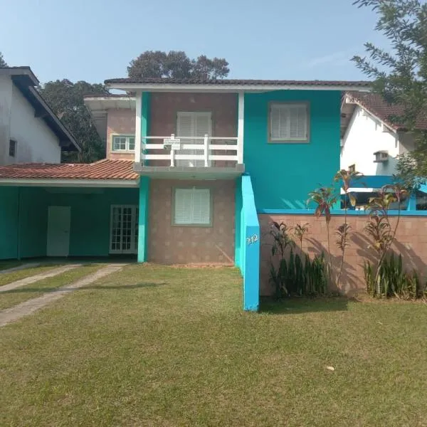 Paraíso de Verão - Disfrute final de semana em Casa Exclusiva com piscina, sinuca e churrasqueira Aluguel para temporada em Riviera de São Lourenço, hotel in Bertioga