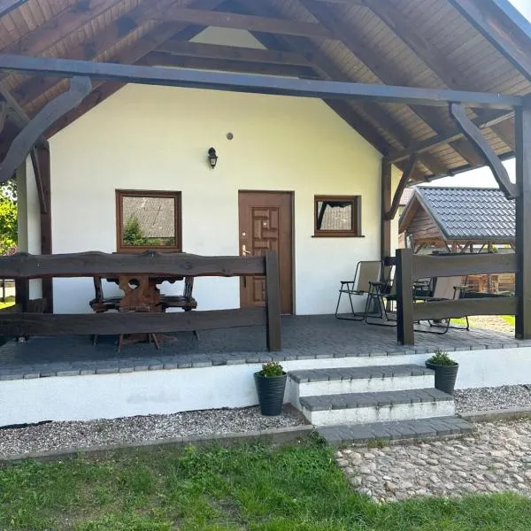 Domek letniskowy 8-osobowy nad jeziorem Wilczyńskim, hotel v destinaci Świętne